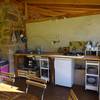 Véranda, côté cuisine -   Camping-Gîte de la Tuilerie (Auvergne-Rhône-Alpes, Rhône)