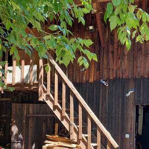 Photo de Chambre dans une grange en bois