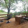 Côté terrasse sous les arbres -   Gîte du Fassac (Occitanie, Tarn)