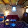 toujours le salon et son canapé-lit royal, -   "Le Gîte" à la Ferme de la Servie (Occitanie, Lot)
