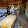 Séjour, cuisine au fond -   Gîte Sainte - Euphémie (Auvergne-Rhône-Alpes, Savoie)